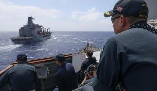 The USS Barry (DDG-52) approaches the USNS Rappahannock (T-AO 204) during an underway replenishment.