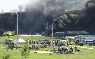 Emergency response teams begin preparing triage areas outside the Pentagon shortly after the 11 September 2001 terrorist attack.