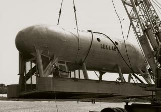 The Sealab I is lowered into the water on 20 July 1964. 
