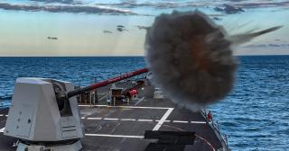 The destroyer USS Rafael Peralta (DDG-115) fires a Mk 45 5-inch gun during a live-fire exercise. The final aim for a commander and crew—with confidence gained by good management and a culture focused on warfighting—is to stop thinking about managing risk and instead impose risk on the adversary.