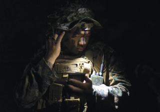 A Marine with the 3d Marine Littoral Regiment applies camouflage face paint during Kamandag 7 in November 2023. Light Marine infantry can protect friendly forces by conducting counterambush actions or even ambushing enemy forces attempting to reach the main body. 