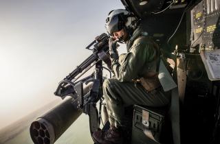 Crew members of a UH-1Y Venom with Marine Light Attack Helicopter Squadron 773 prepare for a live-fire shooting drill. Vandegrift and Halsey’s doctrine of timely cooperation foreshadowed today’s Marine Corps combined-arms doctrine, which calls for forces to maximize combat power through the use of all available resources. 