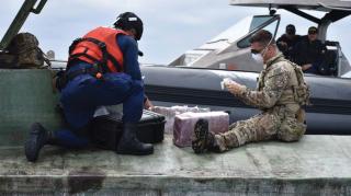 A boarding team from the USCGC Midgett (WMSL-757)