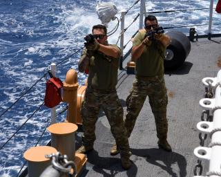 Coast Guardsmen conduct close quarter combat training on the USCGC Mohawk (MNEC-913)
