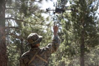 A Marine launches a Skydio drone during a training exercise. The Marine Corps has already been convinced of the utility of SUASs in its infantry formations, but used incorrectly they could spoil the element of surprise or compromise the user’s position.