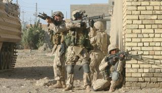 U.S. Marines search houses in Fallujah, Iraq, on 13 November 2004. Infantry Marines have a storied history of wresting control of an objective, no matter the clime or circumstance, and any reenvisioned rifle squad must be up to that task.
