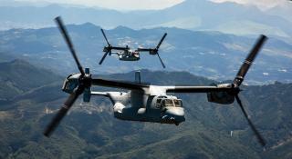 A U.S. Marine Corps MV-22B Osprey from Marine Medium Tiltrotor Squadron 265 flies alongside a V-22 Osprey from the 107th Squadron of the Japan Ground Self-Defense Force in Japan in July 2024.