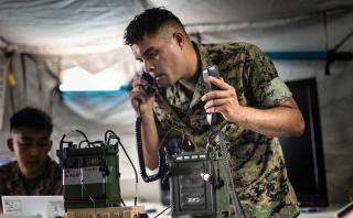 A Marine Corps transmission system operator performs  a radio check during a  command-and-control (C2)  exercise. The current Alpha/Bravo C2 construct, in which both operate within the  weapon engagement zone, provides commanders with  flexibility and resiliency but it also could increase  targetability during war.