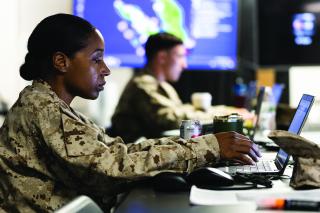 Marines coordinate supply chains during a simulated battlefield scenario at Marine Corps Air-Ground Combat Center, Twentynine Palms, California. Employing home station C2—from the continental United States—during battle could decrease signatures in the field while increasing maneuverability.