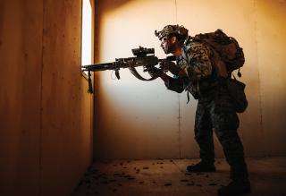 A Marine posts security during the recent Marine Air-Ground Task Force Warfighting Exercise. These exercises do not use home station C2, but a future iteration could test the home station C2  concept to determine  its limitations.