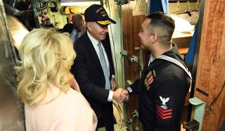 President Joseph R. Biden and First Lady Jill Biden visit with sailors after the commissioning commemoration of the USS Delaware (SSN-791). Political conversations can easily go awry, so it can be best not to discuss specific political candidates.