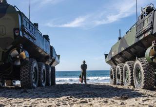 A pair of Amphibious Combat Vehicles (ACVs) from the Amphibious Assault School at Camp Pendleton, California. The school’s Transition Training Unit Operator Certification Course is designed to standardize operator and maintenance training after ACV accidents in 2022 caused the Marine Corps to limit surf-zone operations. Despite the new training, in December an ACV rolled over at the base, killing one Marine and injuring 14 others.