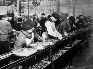 Workers on Henry Ford’s assembly line in Highland Park, Michigan