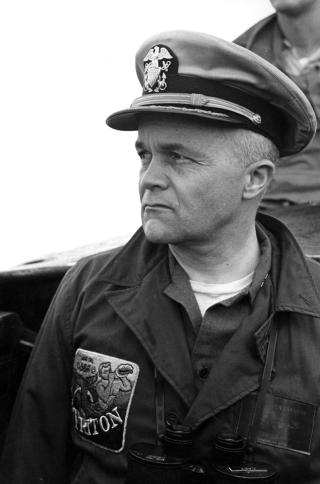 Captain Beach on the bridge of the Triton immediately after the conning tower breached for the first time as she completed her historic submerged circumnavigation. Beach was awarded the Legion of Merit for this feat.