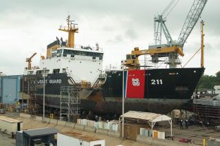The Coast Guard Cutter Oak (WLB-211) sits in drydock for maintenance at the Coast Guard Yard in Baltimore, Maryland. Federal procurement data from 2009 to 2022 suggest that the Coast Guard’s sole federally owned shipyard is more responsive to the service’s schedule demands.