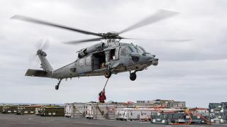Sailors secure ordnance to an MH-60S Seahawk helicopter from Helicopter Sea Combat (HSC) Squadron 6 on board the aircraft carrier USS Nimitz (CVN-68) during an ammunition transfer. With only five aircraft per deployed HSC squadron, it is even more important squadrons have the parts on board and maintenance time in hangars and on the flight deck to keep flying.