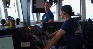 A Coast Guard watch officer on the bridge of the USCGC Mohawk (WMEC-913) 