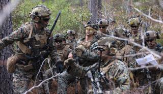 Marines with the 22nd Marine Expeditionary Unit discuss orders before executing a raid during an exercise at Camp Lejeune, North Carolina. Maneuver warfare is much more than rapid movement to surprise an adversary and gain a positional advantage. 
