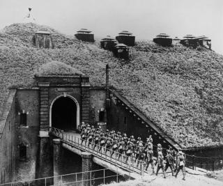 British troops march into an underground fortress, part of the Maginot Line on the French-German border, in December 1939. Because France did not adapt its defensive network to account for the Blitzkrieg tactics Germany demonstrated in its invasion of Poland, the Wehrmacht steamrolled its way around the line.