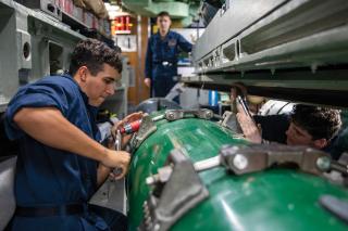 Sailors on board the Los Angeles–class fast-attack submarine USS Annapolis (SSN-760) work on a Mk 48 heavyweight torpedo. Large size and complex stowage mean it can take as much as an hour to reload a submarine’s torpedo tubes, leaving a boat essentially defenseless during the post-attack period when it is most vulnerable to detection.