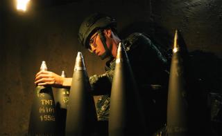 A Taiwan Army soldier prepares artillery shells during a military exercise in July 2024. Effective attrition of PLA forces would require a combination of urban and mountain subterranean operations and indirect fires, such as artillery from hardened facilities.