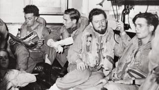 BPF fighter pilots, with one reading the U.S. Army Air Forces’ Impact magazine, wait in HMS Indefatigable’s ready room before taking off on a July 1945 mission. One of the British fleet’s fighter squadron commanders recalled, “The general sensation of being over Japan was one of foreboding, deep fear.”