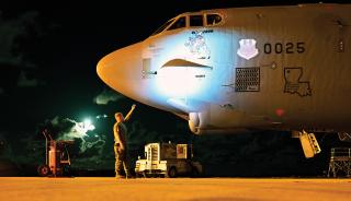 An airman works on a B-52 bomber from Barksdale Air Force Base, Louisiana, at Navy Support Facility, Diego Garcia, in March 2024. While it seemed for a time that issues surrounding Mauritius’s sovereignty over Diego Garcia were resolved, the U.S. base on the island may continue to be an issue.