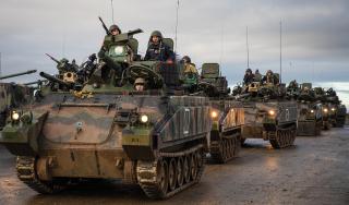 U.S. Army soldiers drive modified M113 armored personnel vehicles during an exercise with allies in Germany. Despite being an older design, the M113 has proven its worth in Ukraine because of its simplicity, armor protection, and ease of repair.