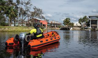 Search and rescue continues to be a top service priority. Right: As Hurricane Helene approached in September 2024, an aircrew from Air Station Clearwater rescued a man and his dog from a disabled sailboat off Sanibel Island. Above: In the hurricane’s aftermath, the Coast Guard and partners agencies conducted coastline and canal searches and inspected for structural damage and possible pollution concerns. 