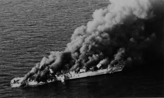 18 April 1988: Hit by cluster munitions and three Harpoon missiles, the Iranian frigate Sahand burns after being attacked by aircraft of Carrier Air Wing 11 from the USS Enterprise (CVN-65). The attack was part of Operation Praying Mantis, launched after the Roberts incident four days earlier. The frigate Sabalan, oil platforms, speedboats, and a missile boat also were struck during the operation. 