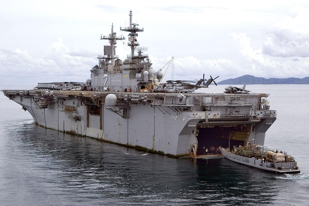 The USS Essex loads an LCU from her stern gate.