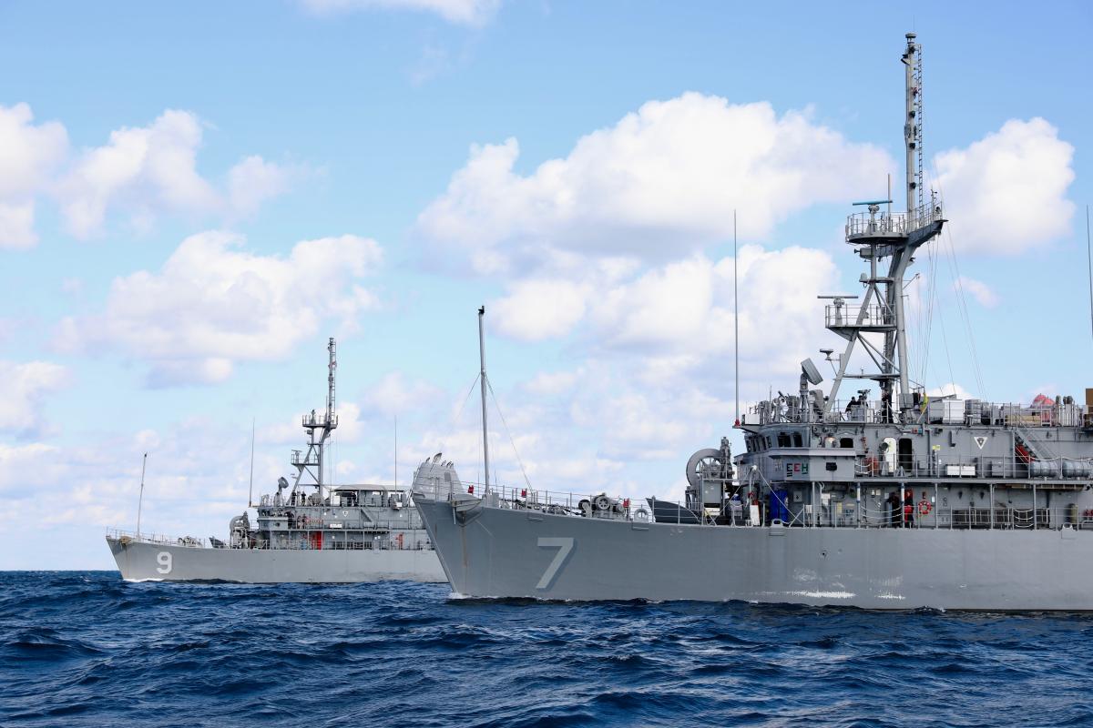 Avenger-class mine countermeasures ships USS Pioneer (MCM-9) and USS Patriot (MCM-7) underway in the Sea of Japan