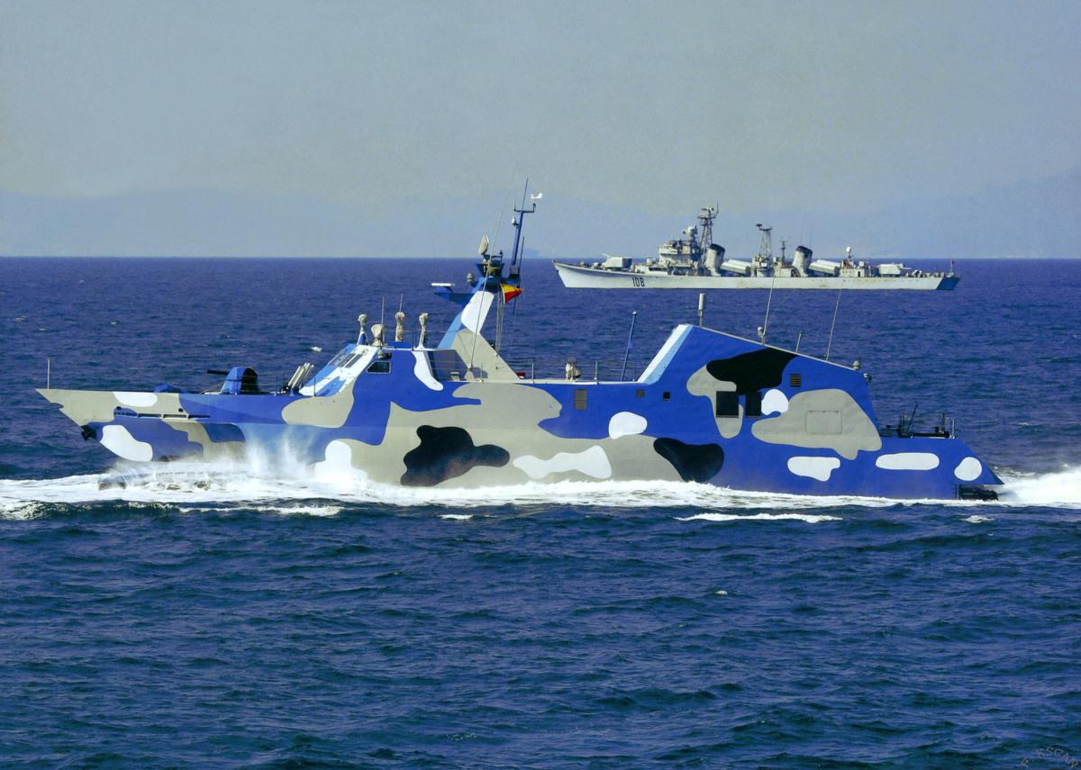 Right surface profile view of a A PLAN Houbei (Type 022)-class fast attack craft underway
