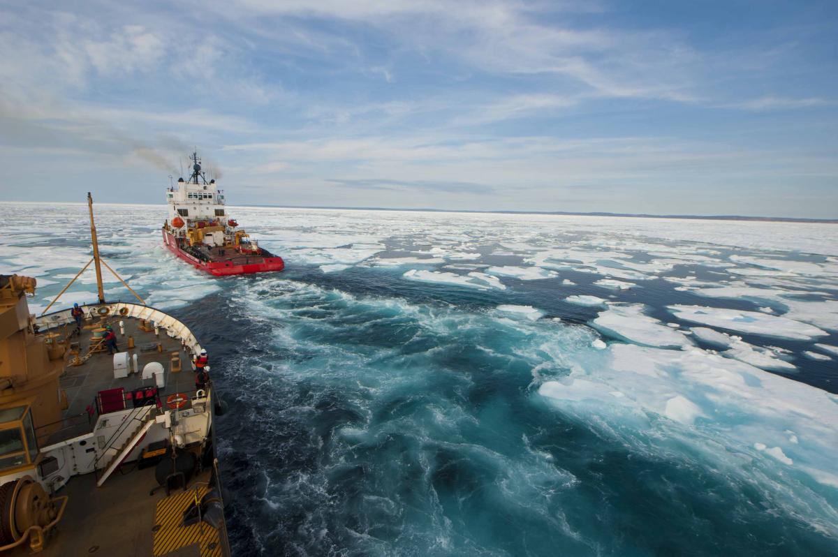 The U.S. Coast Guard Cutter Maple (WLB-207) follows the Canadian Coast Guard icebreaker Terry Fox through the waters of the Franklin Strait during a transit of the Northwest Passage 