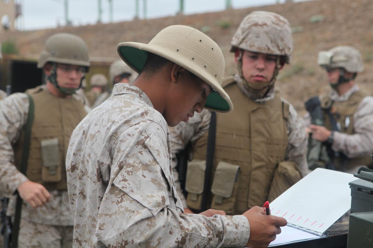 A rifle range instructor prepares to train Marines
