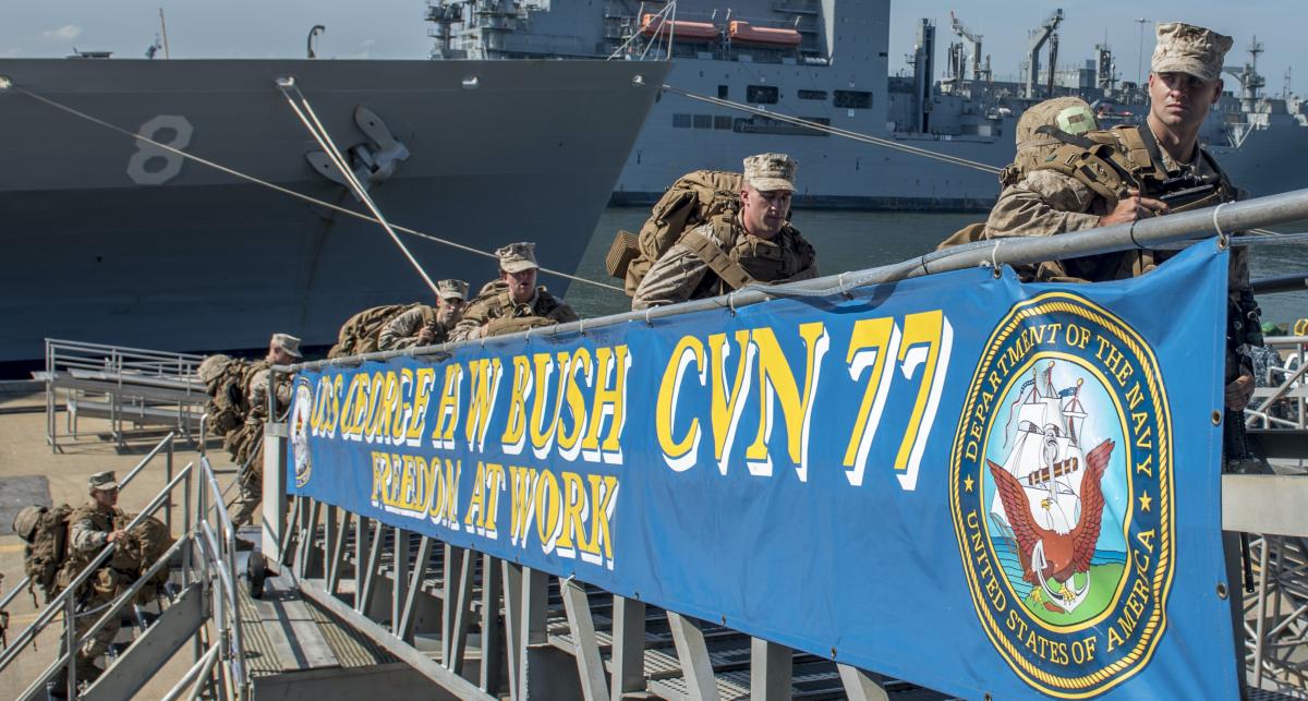 Marines board the USS George H. W. Bush (CVN-77) in Norfolk, Virginia, for ship-familiarization training.