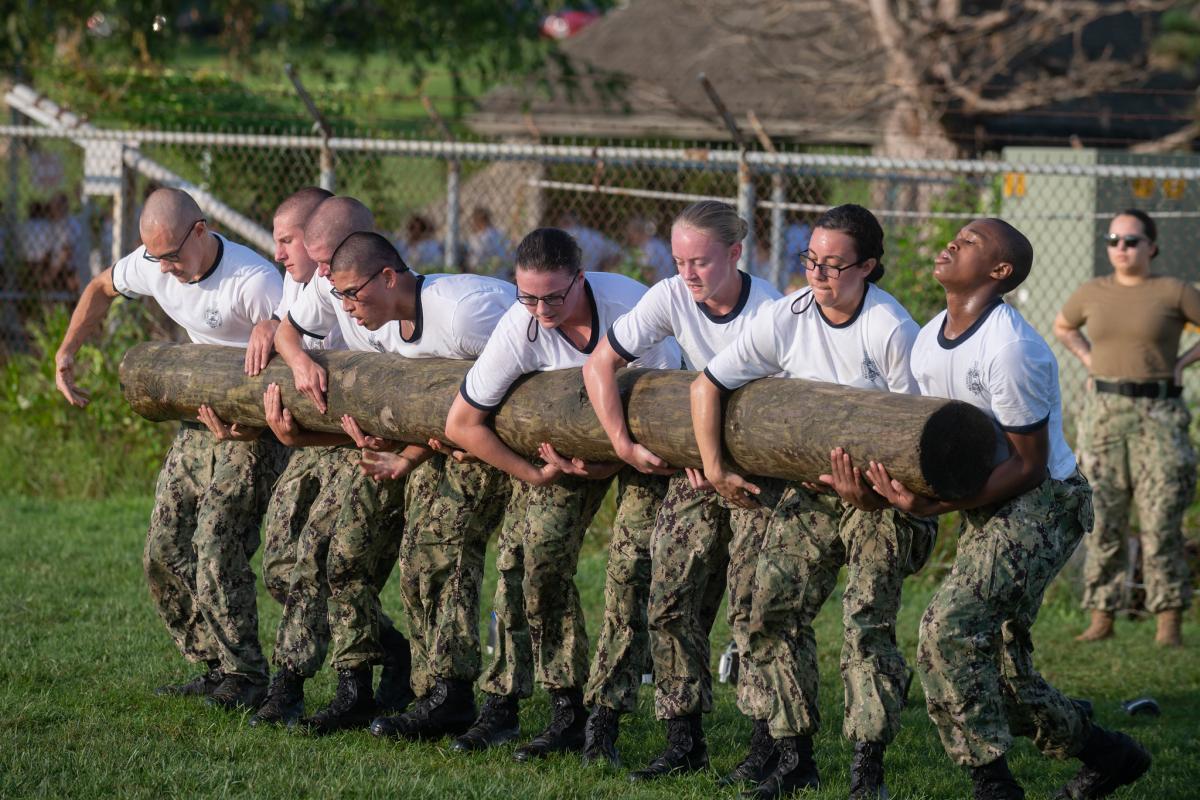 Plebes from the U.S. Naval Academy Class of 2024 complete the squad combat course during Plebe Summer.