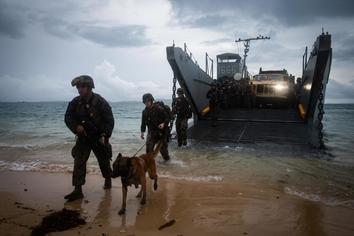 Marines with from the 31st Marine Expeditionary Unit debark a landing craft, utility, during a simulated humanitarian assistance and disaster relief exercise in Okinawa. 