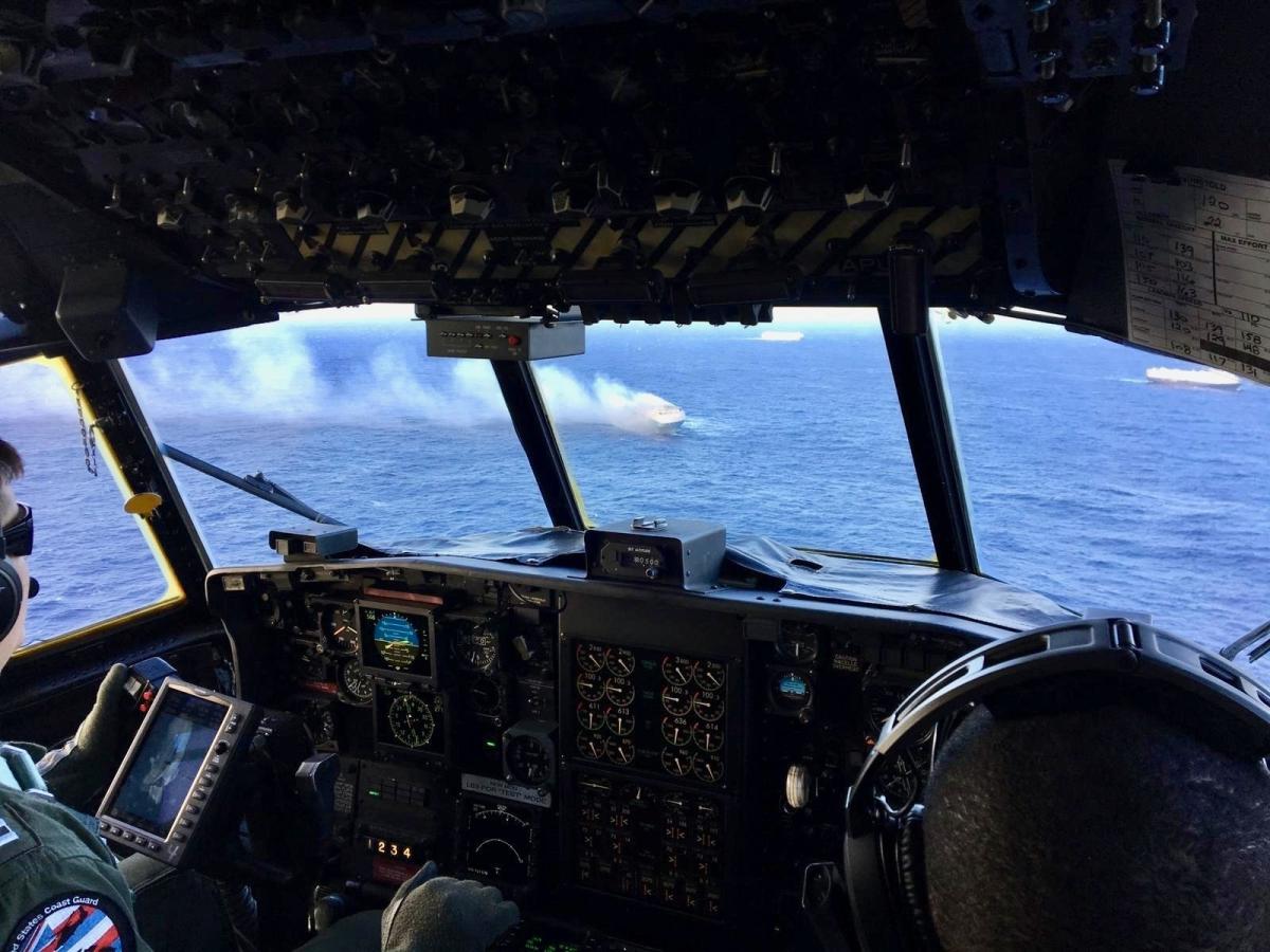 Coast Guard HC-130 flies over the Sincerity Ace in December 2018. 