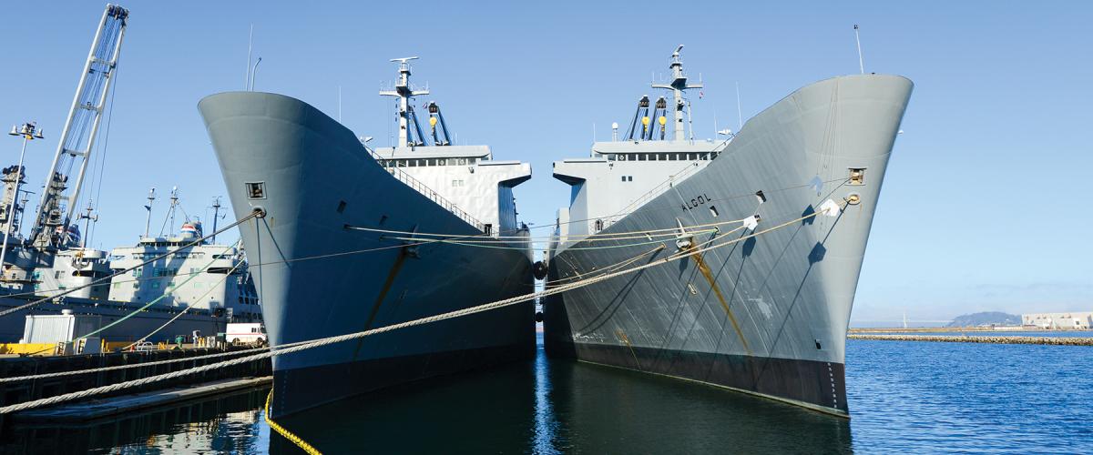 The SS Capella (T-AKR-293) and Algol (T-AKR-287), fast sealift ships of the Ready Reserve Force, wait moored in Alameda, California. Of the many issues the U.S. Navy would face in a conflict in the western Pacific, shortfalls in logistics—sealift in particular—could be the most significant.