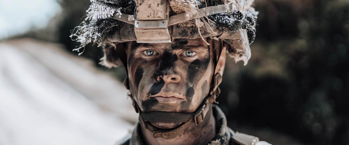 A Marine assigned to 3d Marine Division under the unit deployment program during live-fire maneuver drills on Camp Schwab, Okinawa, Japan.