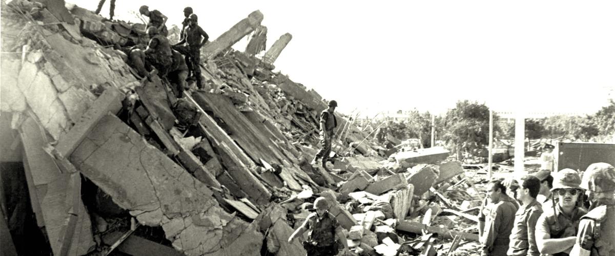 October 1983: The U.S. Marine Corps’ Battalion Landing Team headquarters at the Beirut International Airport has been reduced to a rockpile after a gargantuan explosion triggered by a suicide-crashed 19-ton truck laden with high explosives. It is the deadliest day for the Corps since World War II.