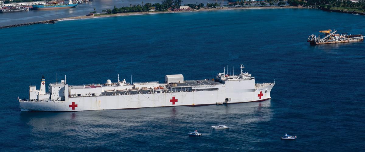 The USNS Comfort (T-AH-20) anchored off Haiti.
