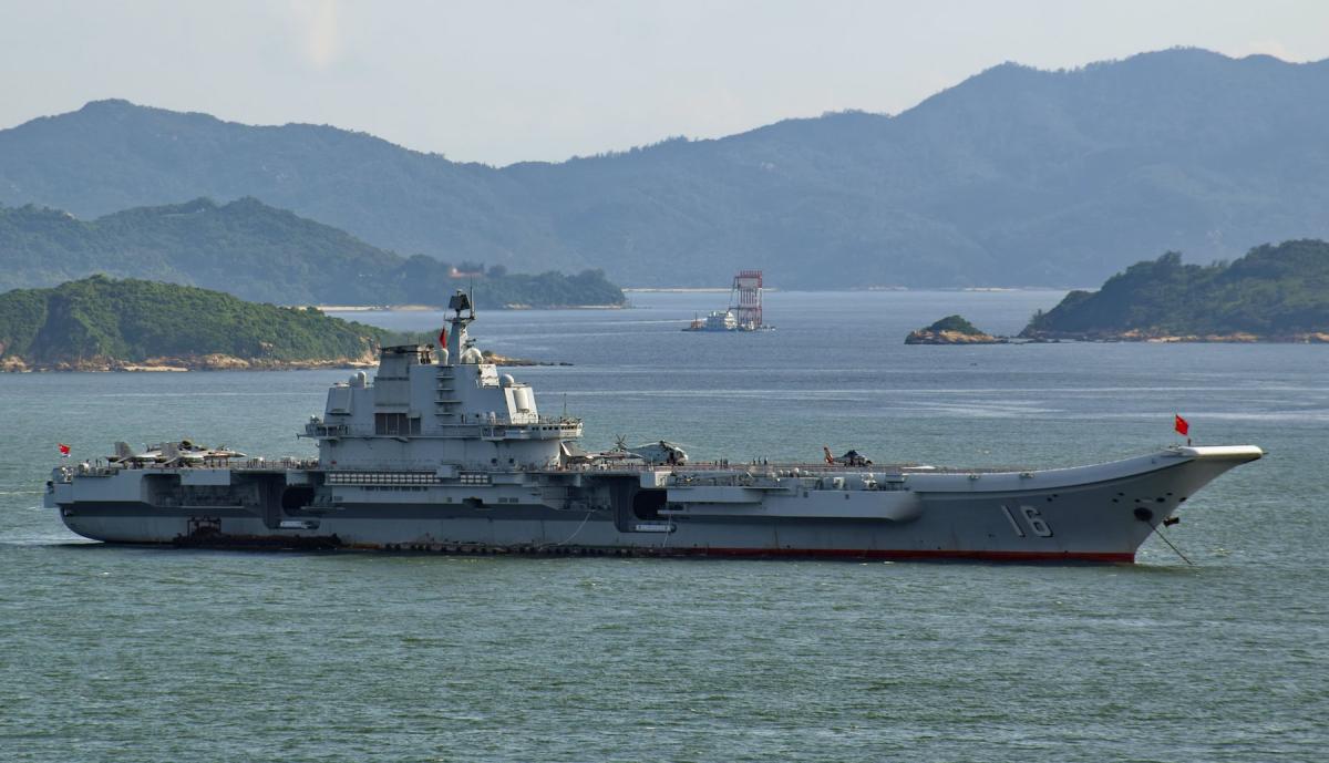 Chinese aircraft carrier Liaoning riding at anchor.
