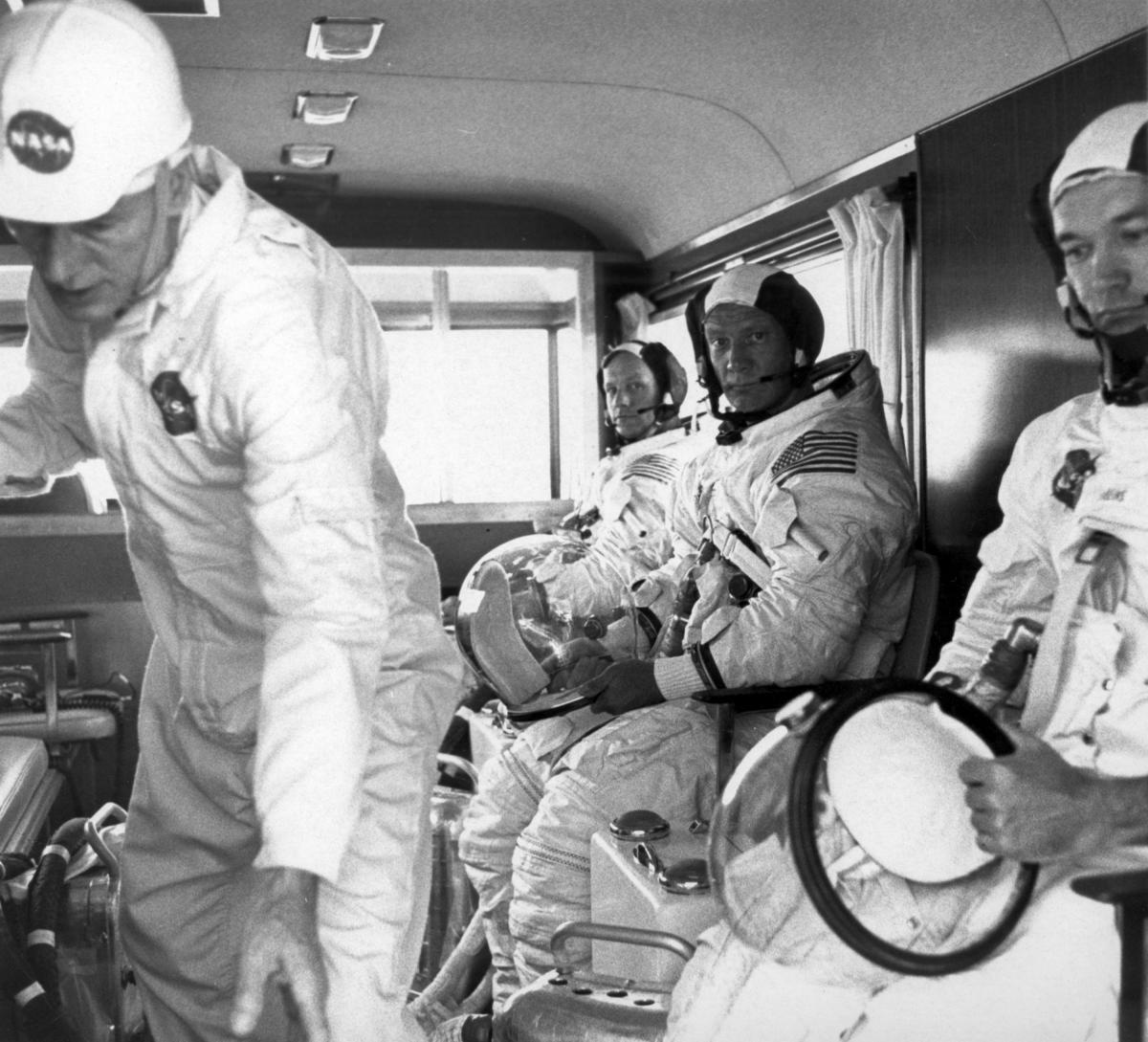 A NASA technician at left checks instruments inside a van to Kennedy Space Center Launch Complex 39A for a pre-flight test