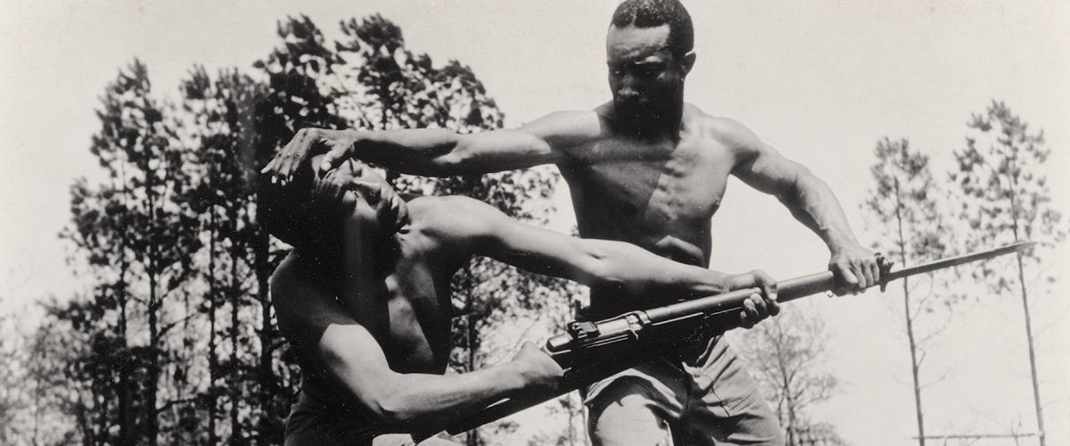 In an undated photo from the 1940s, Corporal Alvin “Tony” Ghazlo, senior bayonet and unarmed combat instructor at Montford Point, North Carolina, disarms his assistant, Private Ernest “Judo” Jones.