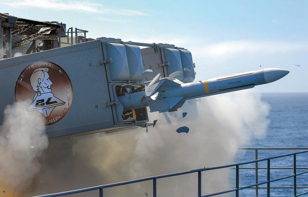 RIM-7 Seasparrow missile is fired from the trainable Mk 29 launcher.