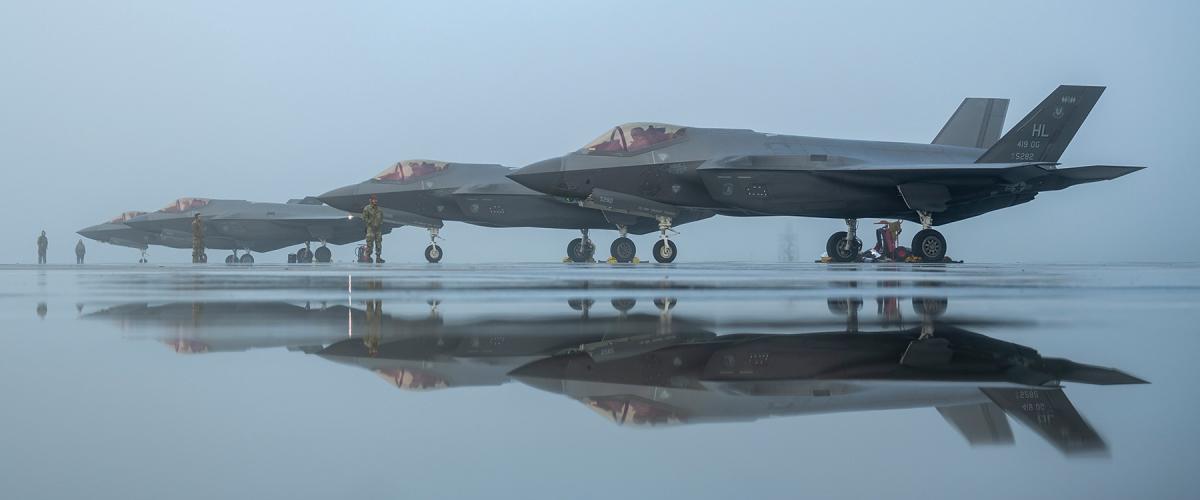 F-35A Lightning IIs prepare for an agile combat employment (ACE) exercise in March 2024. Under ACE, in the event of conflict, Air Force aircraft would quickly disperse to a variety of forward locations to complicate the enemy’s  targeting process. Adding deception techniques could further protect U.S. aircraft. 