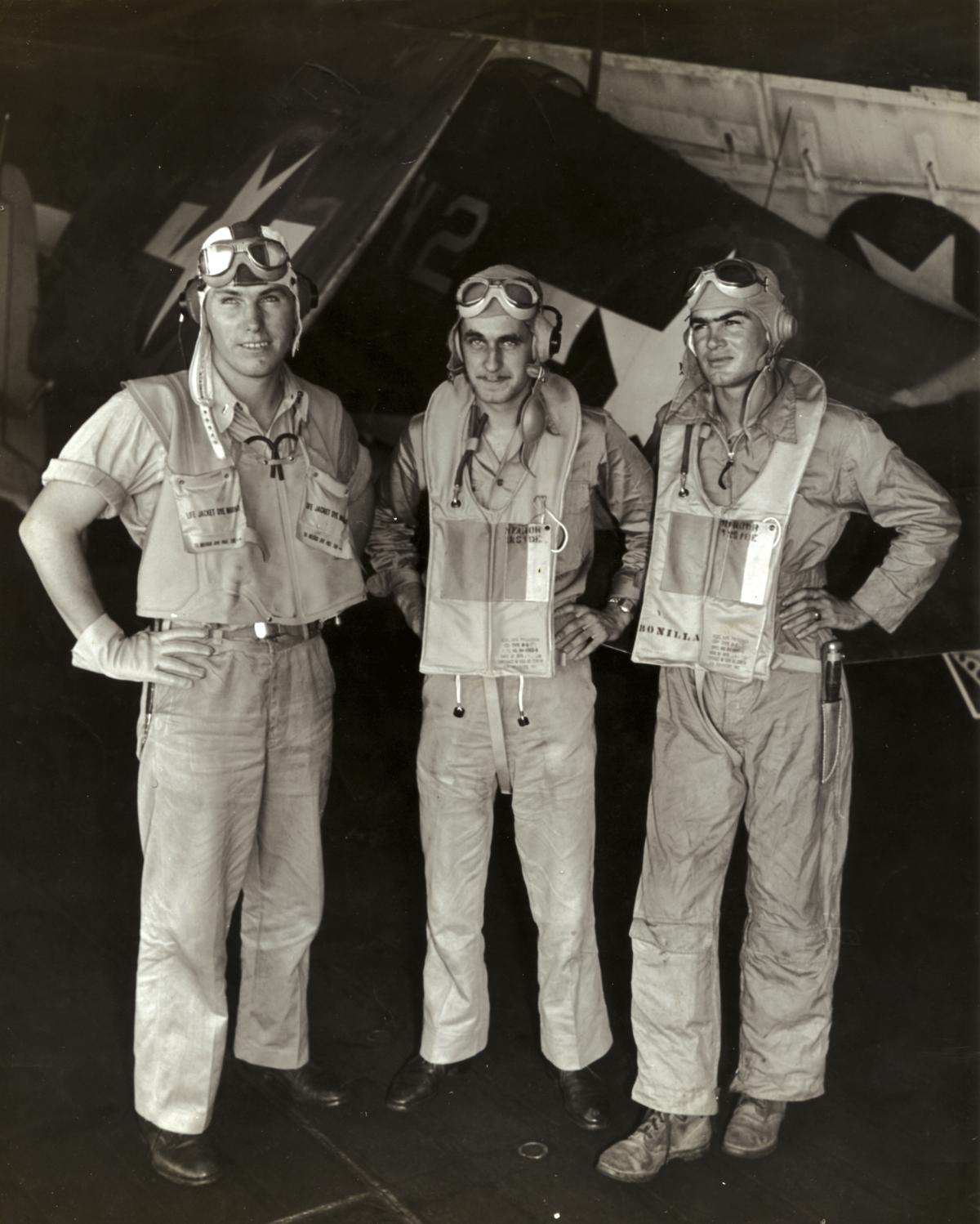 Lieutenant (junior grade) William “Mac” McCarthy (center); the author, Aviation Ordnanceman Second Class Paul Bonilla (right); and Lieutenant (junior grade) Richard Johnson are pictured back on board the USS Lexington after being shot down and rescued. 