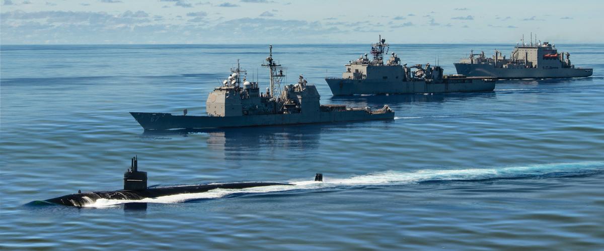 The USS Chicago (SSN-721, front) proceeds on the surface with the USS Shiloh (CG-67) and Comstock (LSD-45) and USNS Charles Drew (T-AKE-10) during operation Valiant Shield 2020. The theater undersea warfare commander is the best command-and-control structure to maintain undersea domain awareness and ensure deterrence against near-peer submarines.